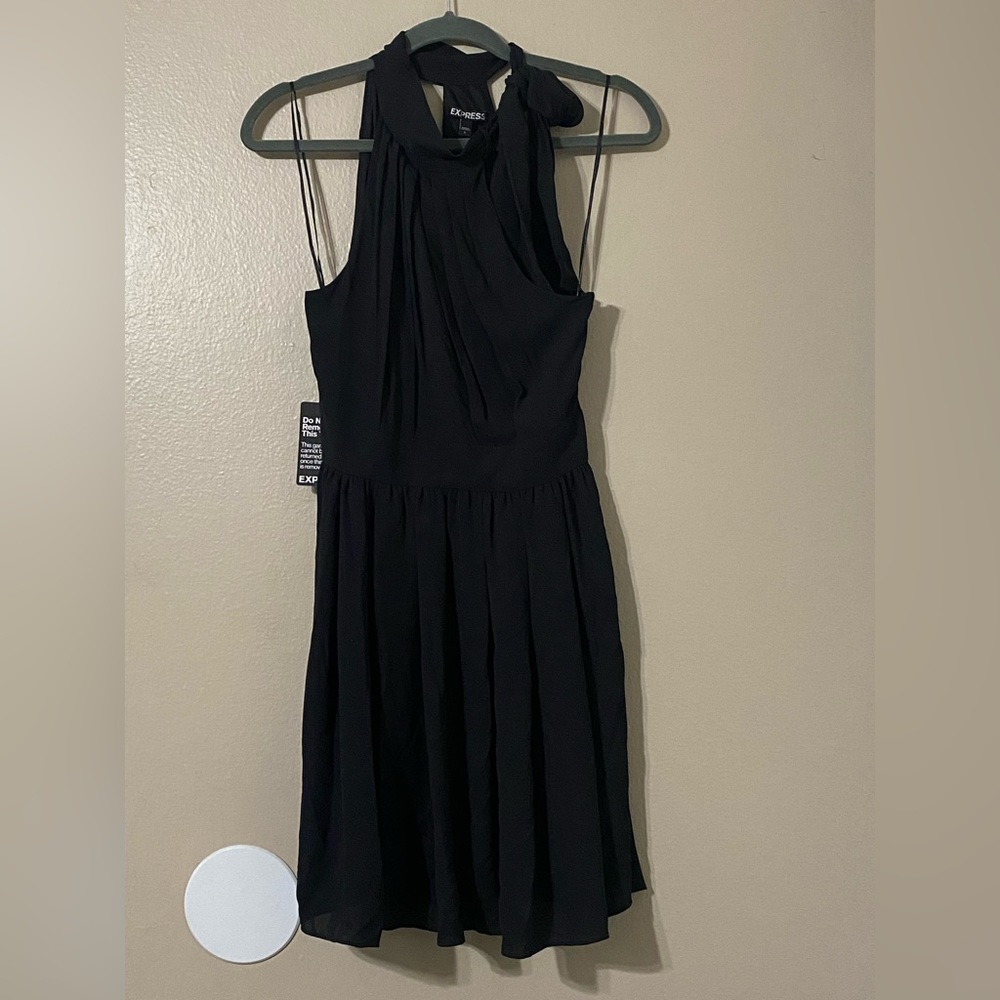 Super cute express  NWT black dress up to the knee I believe